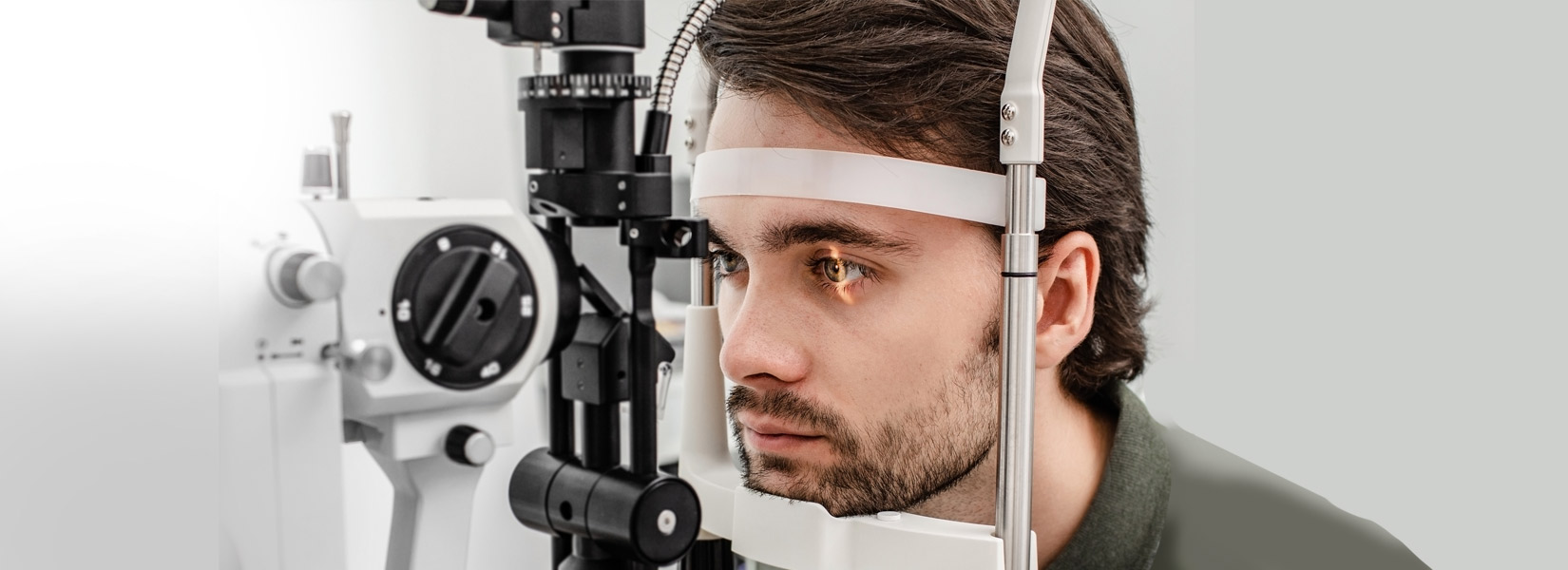 young man during eye exam in Creve Coeur Township